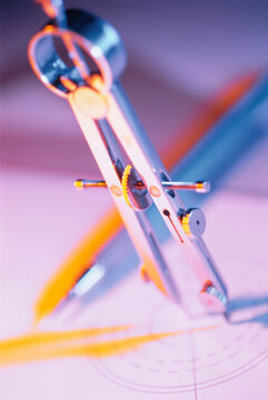 Close-Up of Compass and Drafting Pencil