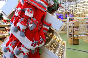Boots of Santa Claus ,Saint Nicholas for gifts in store among toys and decorations. Santa s shoes at shop, shopping