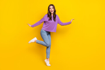 Fototapeta na wymiar Full body portrait of cheerful nice lady enjoy dancing partying isolated on yellow color background