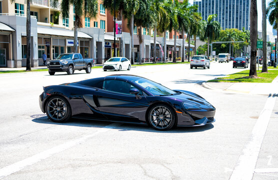 Miami Beach, Florida USA - April 15, 2021: mclaren 570GT MSO Black Collection, front side view.