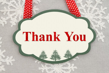 Thank you wood sign on snowflakes