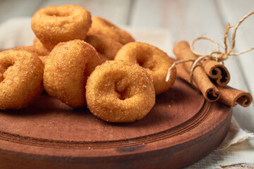 Traditional American doughnuts with cinnamon and sugar icing