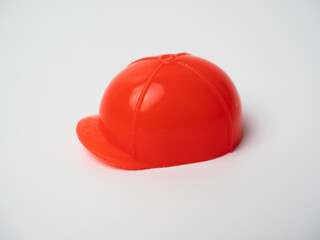 Picture of an orange plastic cap miniature