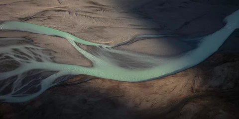 Fotobehang Grijs An aerial view of the braided Tasman River within Mount Cook National Park in New Zealand.  © Nick