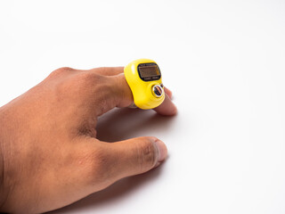 Picture of a yellow digital tally counter