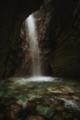Fototapeta na wymiar The trollkirka cave waterfall