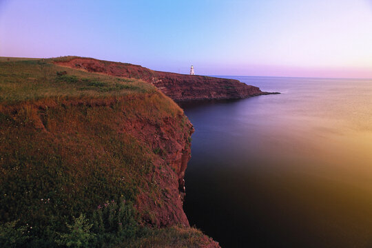 Cape Tryon Lighthouse and Gulf Of St. Lawrence at Sunrise, Cape Tryon, P.E.I., Canada