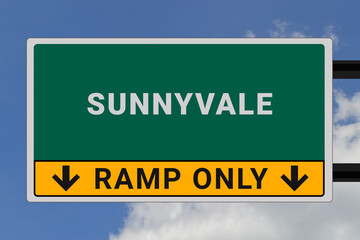 Sunnyvale logo. Sunnyvale lettering on a road sign. Signpost at entrance to Sunnyvale, USA. Green pointer in American style. Road sign in the United States of America. Sky in background