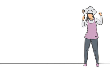 Single one line drawing female chef stands with celebrate gesture, holding spoon and wearing apron prepares ingredients to cook the best dishes. Continuous line draw design graphic vector illustration