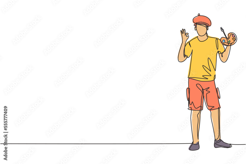 Poster single continuous line drawing painter stands with gesture okay using a hat and painting tools to pr