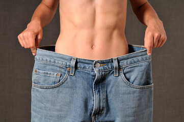 Boy Wearing Large Jeans