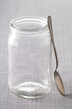 Close-up of Empty Glass Jar and Spoon