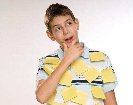 Boy Covered in Sticky Notes