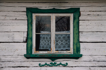 Window in an old wooden house.