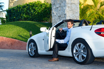 Man Getting Out of Car, Reef Playacar Resort and Spa Hotel, Playa del Carmen, Quintana Roo, Yucatan Peninsula, Mexico