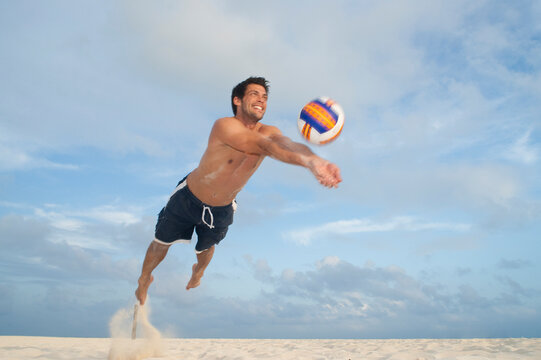 Man Playing Volleyball, Reef Playacar Resort and Spa Hotel, Playa del Carmen, Quintana Roo, Yucatan Peninsula, Mexico