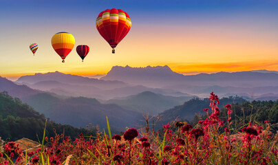 Colorful hot air balloons flying over Doi Luang Chiang Dao mountain peak on viewpoint in national...