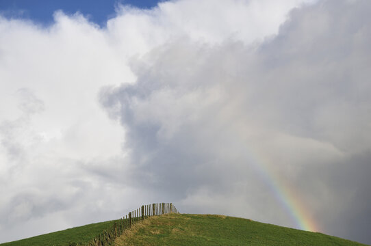 Rainbow and farmland, Taranaki, North Island, New Zealand