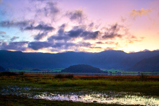 lagoon in volcano crater at sunset , tepetiltic nayarit