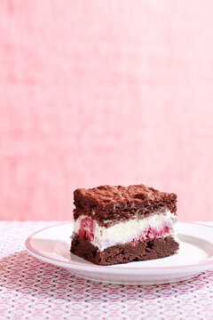 Brownie Ice Cream Sandwich with Raspberry Ice Cream, Pink Background, Studio Shot