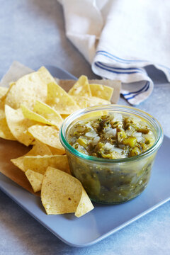 Tomatillo salsa served with corn tortilla chips