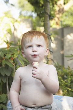 Toddler Eating Ice Cream Cone