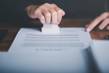 Businessman validates and manages business documents and agreements, signing a business contract...
