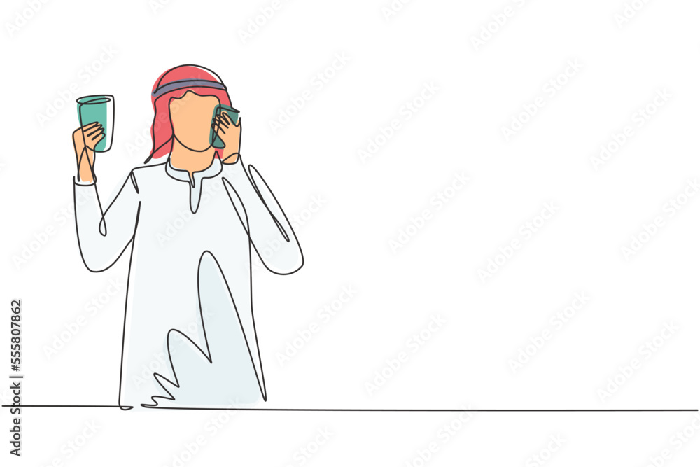 Poster single continuous line drawing young arabian man drinking orange juice while making phone call with 