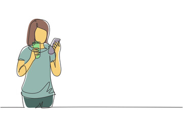 Continuous one line drawing smiling beautiful woman looking at mobile phone and holding glass of orange juice while having breakfast at cozy home. Single line draw design vector graphic illustration