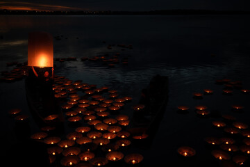 Thai people come out to float the Krathong on the full moon day of the 12th month of the year every...