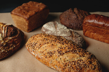 Multigrain sourdough bread with other craft bread in the background