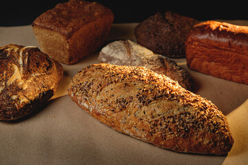 Multigrain sourdough bread with other craft bread in the background
