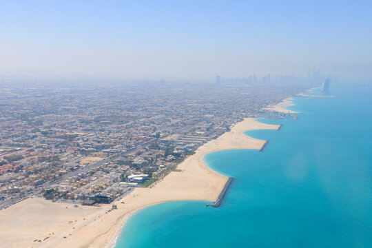 Aerial View of Jumeirah Beach with Burj Al Arab Hotel in background, Dubai, United Arab Emirates