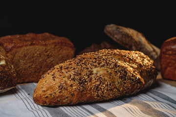 Multigrain sourdough bread with other craft bread in the background