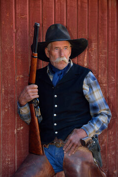Portait of Cowboy with Rifle, Shell, Wyoming, USA