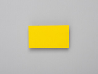 Yelow Blank business card for corporate identity on gray background. Creative mockup.