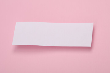 Blank white concert tickets or banners mockup isolated on pink background