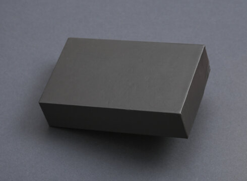 Black box mockup levitating on gray background