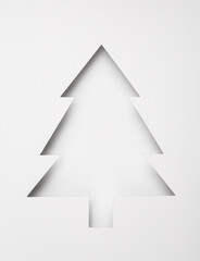 Cut paper in the shape of Christmas tree