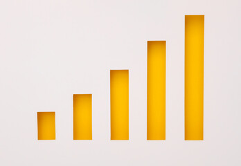 Charts cut out of paper hole. Business concept