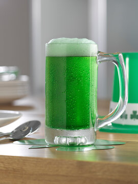 Glass of Green Beer on Table