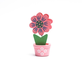 Toy decorative plant on white background