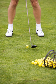 Man on Golf Course With Bucket of Balls, Burlington, Ontario, Canada