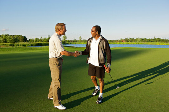 Men Shaking Hands on the Golf Course, Burlington, Ontario, Canada