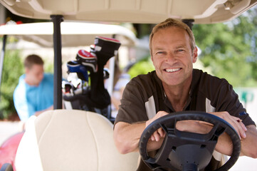 Portrait of Man in Golf Cart