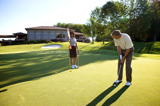 Couple Golfing, Burlington, Ontario, Canada
