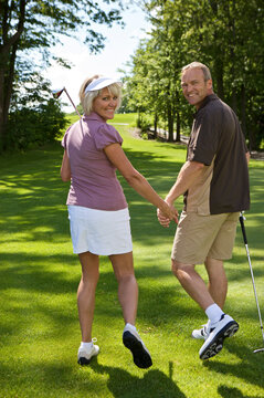 Portrait of Couple Golfing, Burlington, Ontario, Canada