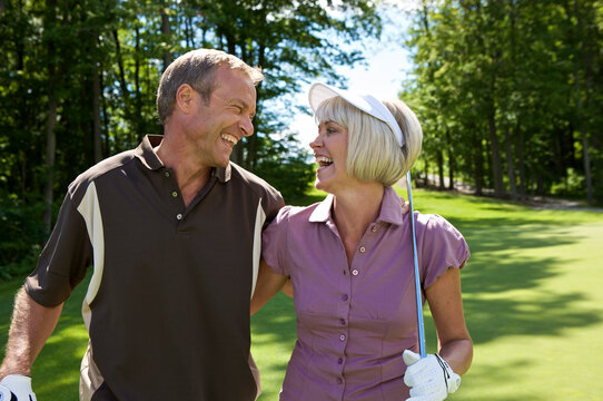 Portrait of Couple Golfing