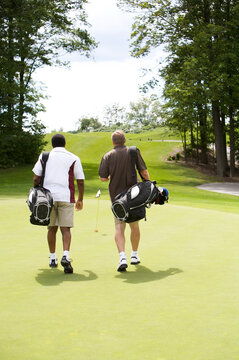 Men Walking on Golf Course, Burlington, Ontario, Canada