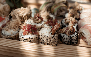 Sushi set on a wooden serving close-up